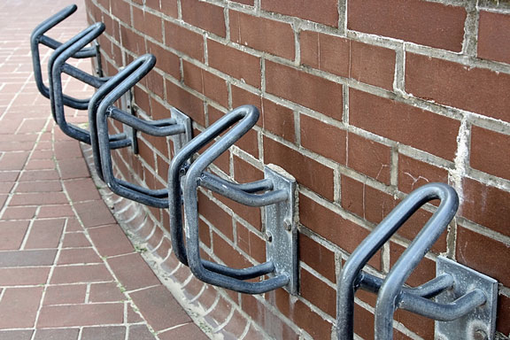 five metal bicycle racks