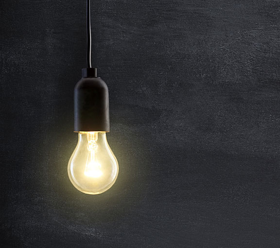 blackboard behind light bulb