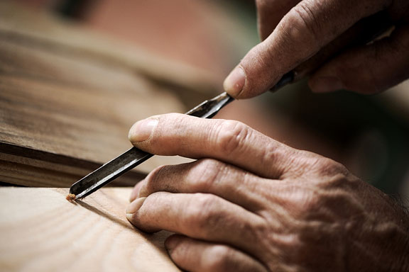 carving wood with a gouge