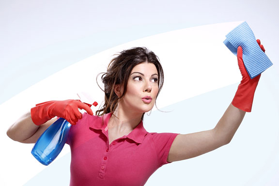 woman cleaning a window