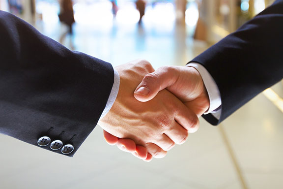 shaking hands on a business deal