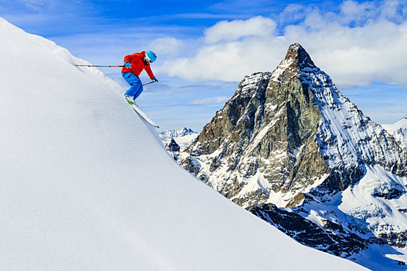 skiing downhill in fresh snow