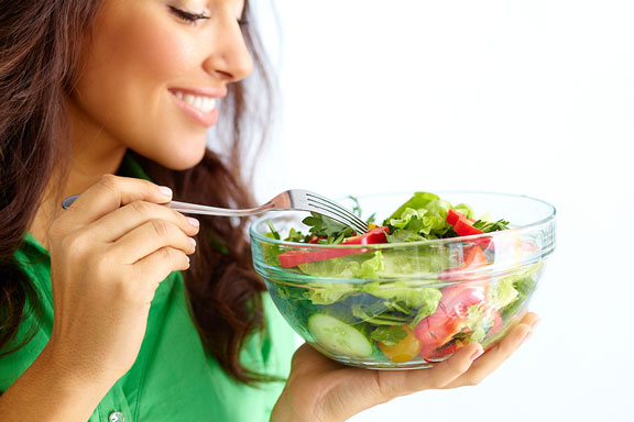 woman eating a salad