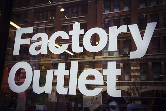 Factory Outlet sign on a store window