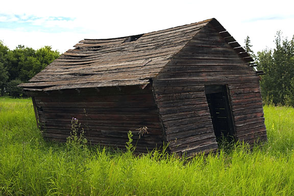 rickety old storage shed on a farm