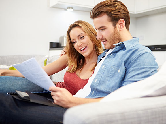 young couple reviewing their finances