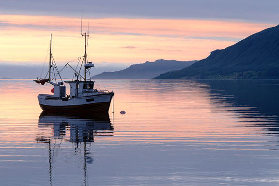 fishing boat at sunset