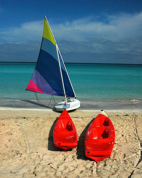 kayaks and sailboat