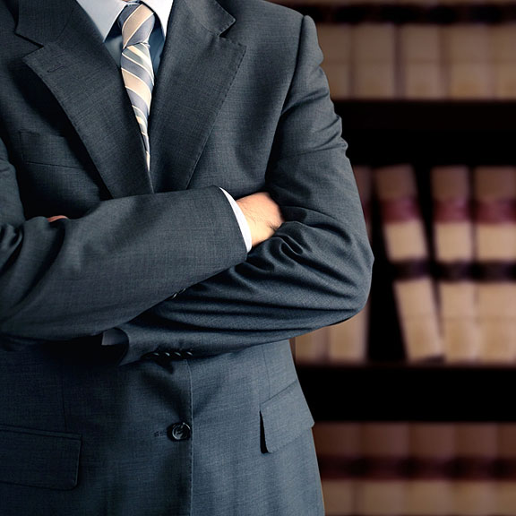 lawyer standing in law library