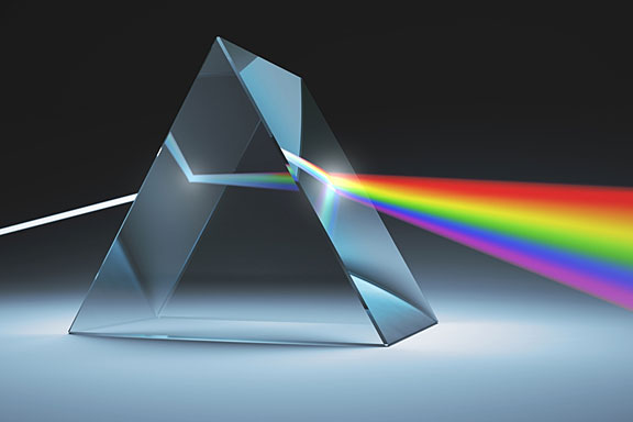prism refracting light into a rainbow of colors