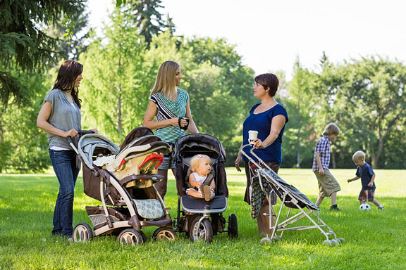 moms with children, visiting in a park