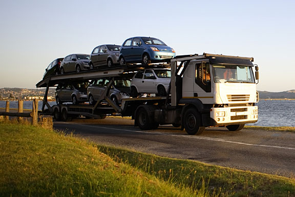 motor vehicles on a transporter truck