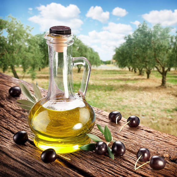 olive oil flask and black olives