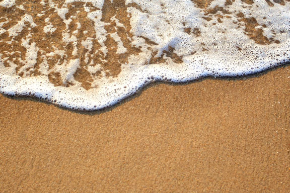 sandy beach and gentle wave