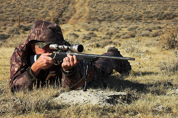 hunter using a hunting scope