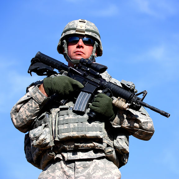us soldier against blue sky background