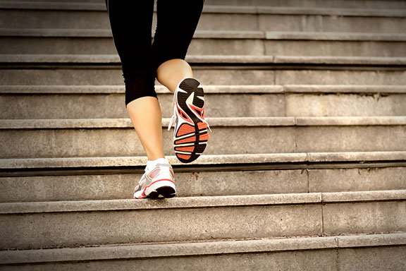 woman climbing stairs