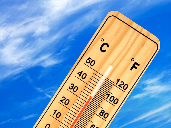 warm temperature reading on a thermometer