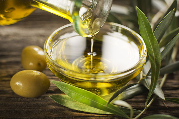 virgin olive oil and fresh olives