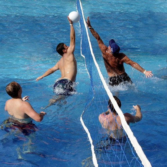 playing water polo in a pool