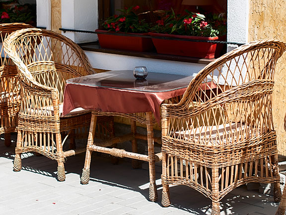 wicker furniture at an outdoor cafe